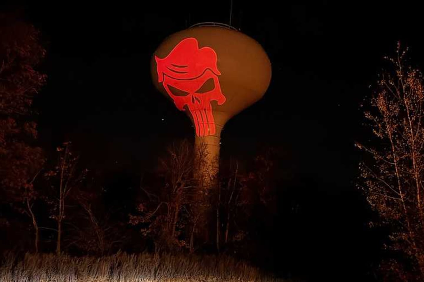 The "Punisher" logo, sporting Donald Trump’s hairstyle, projected onto a water tower on Nov. 6. (WCVB)