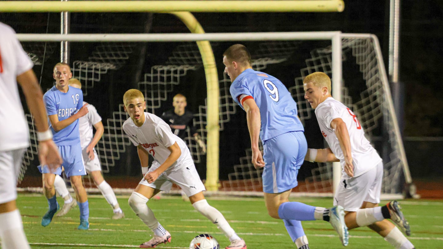 Medfield senior captain Charlie Curmi looks for an opening in the Pembroke defense the Warriors' 2-0 victory in Division 3 tournament play Thursday in Medfield.