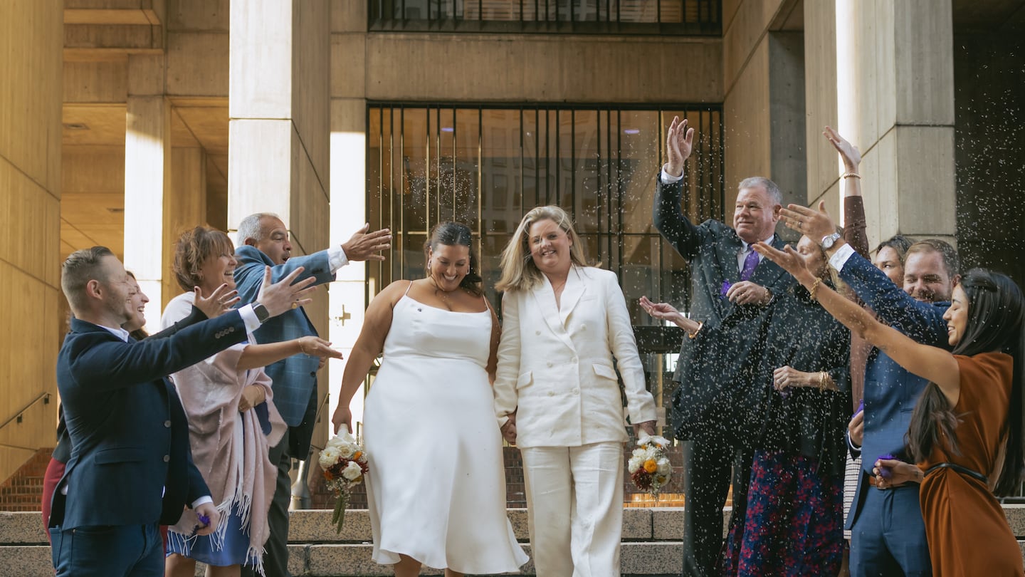 Marisa Siino (left) and Mary Mulcahy wed at Boston City Hall on Oct. 11, with 9 family members there to celebrate the day.