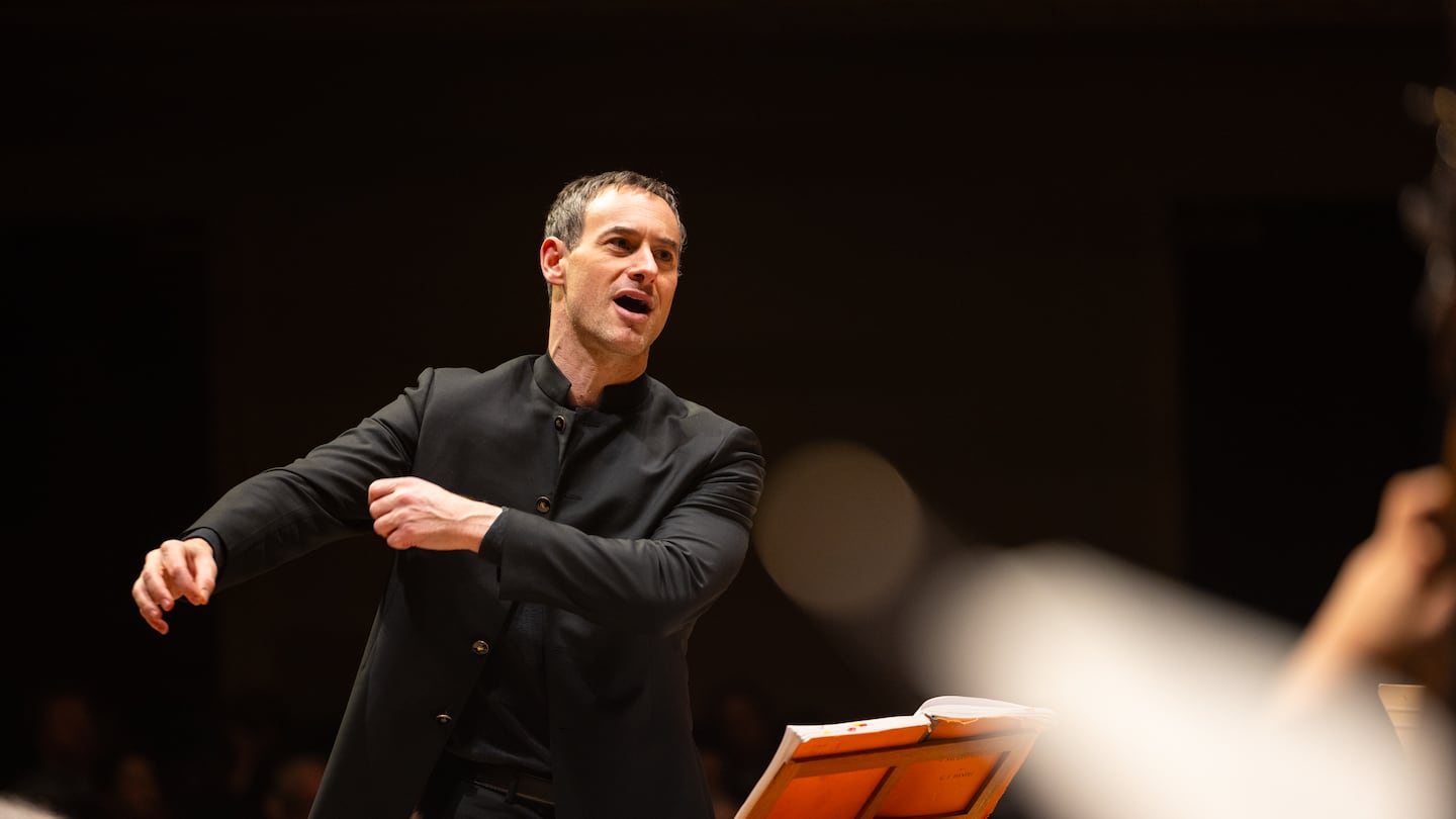 Handel and Haydn Society artistic director Jonathan Cohen, seen here conducting Handel's "Messiah" at Symphony Hall in 2023, will lead this year's "Messiah" with dozens of additional singers from the Boston choral community and the organization's youth choir.