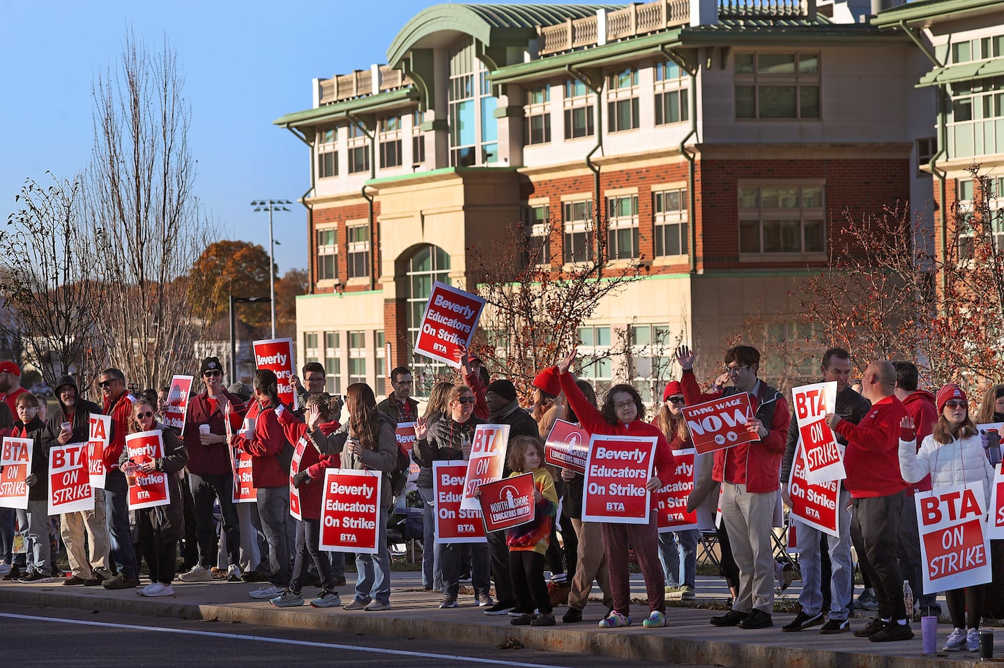 Beverly teachers on strike Friday morning outside Beverly High School.