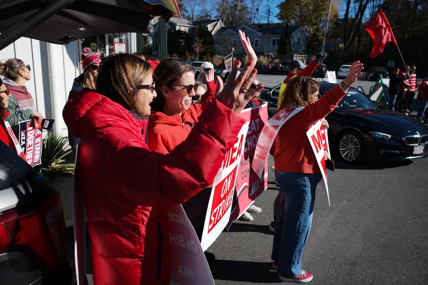 Natalie Belli (left) and other Marblehead Education Association members rallied Saturday.