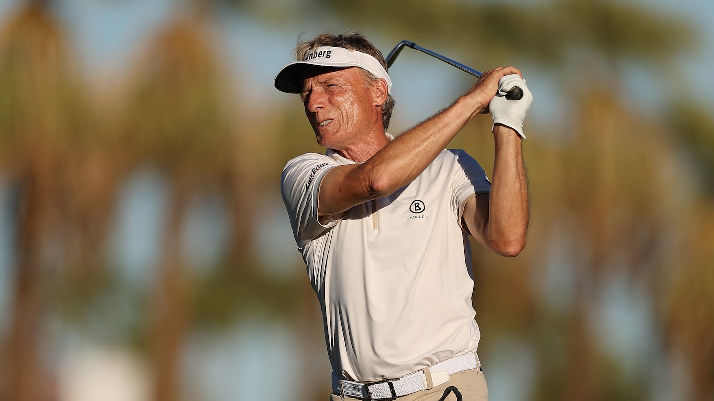 Bernhard Langer of Germany plays his second shot on the 14th hole during the third round of the Charles Schwab Cup Championship.