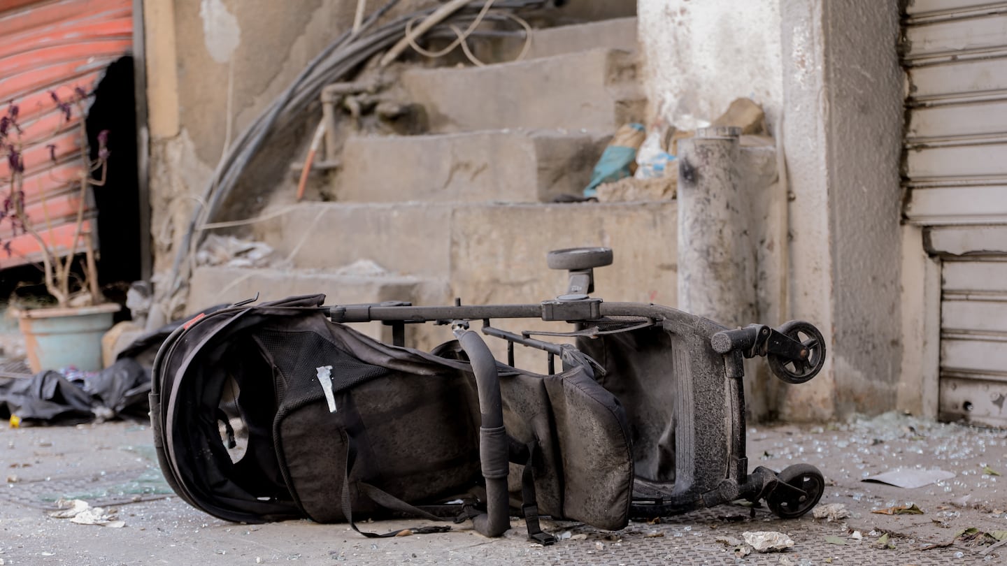 A flipped and destroyed stroller lay amid rubble in the aftermath of an Israeli airstrike in Barja, Lebanon, on Saturday.