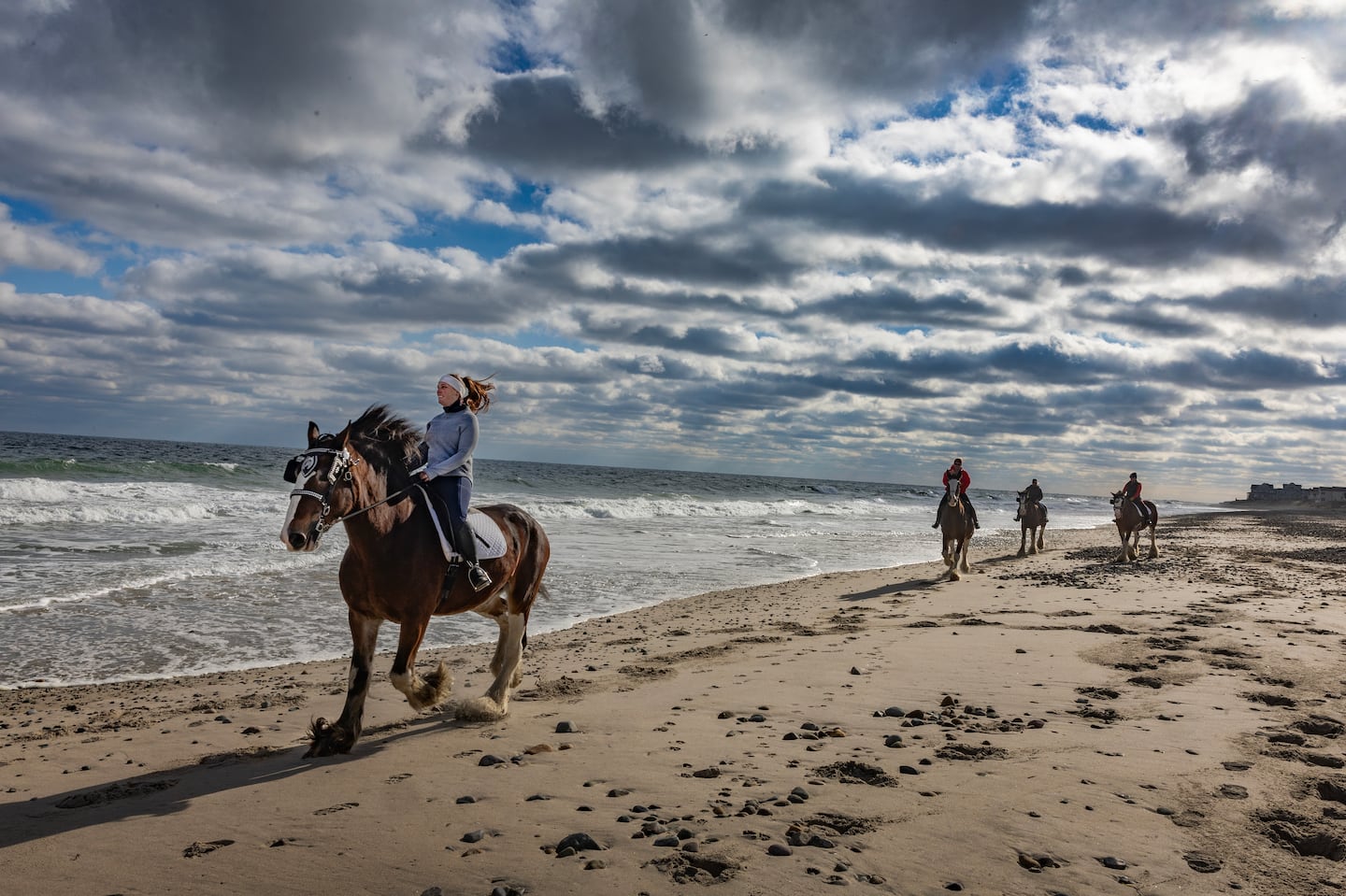 Mallory Hayes rode Ritz as the HKS Clydesdales enjoyed a day at Rexhame Beach in Marshfield.