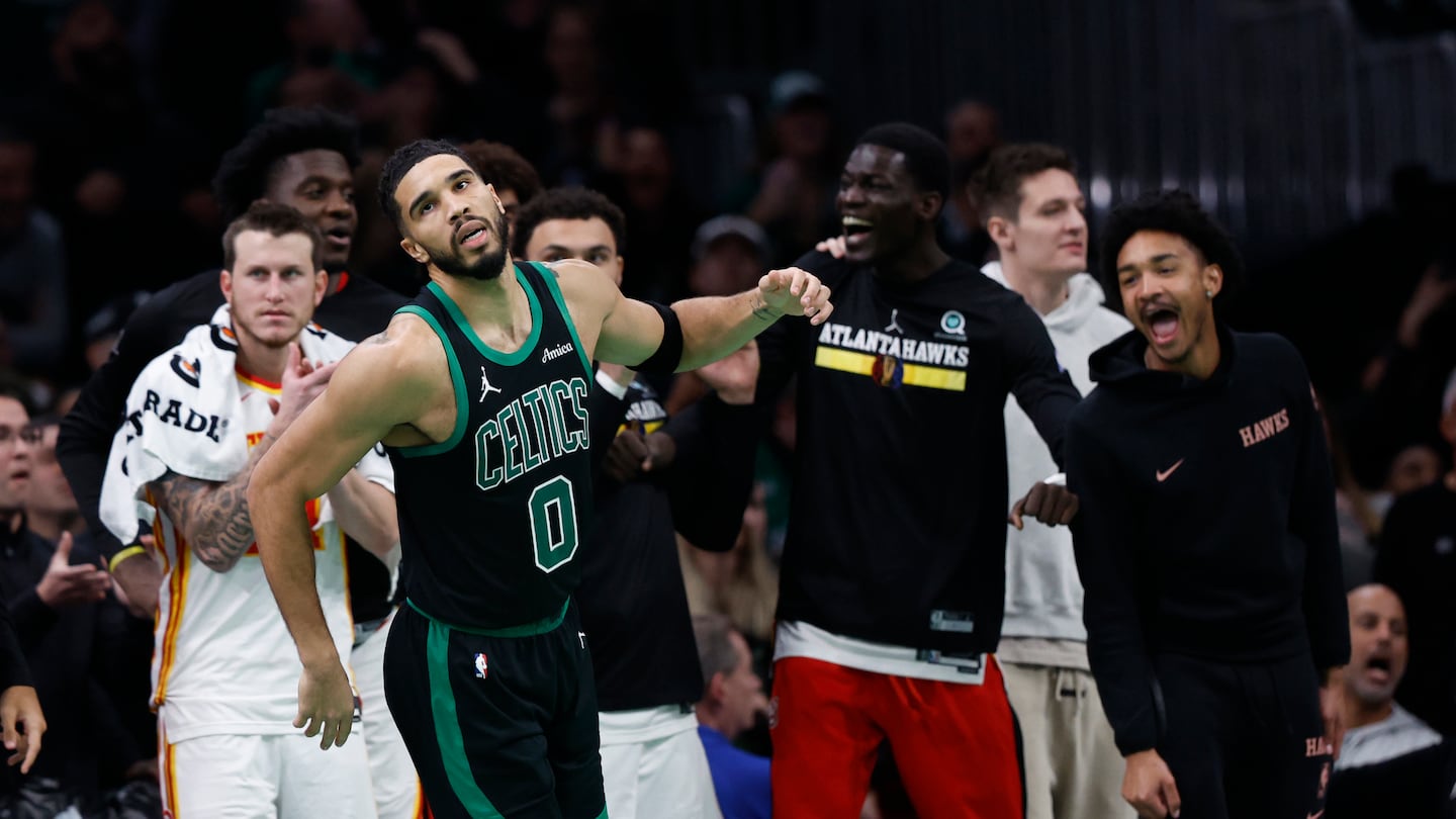 The Hawks bench reacts after Celtics forward Jayson Tatum (0) after missed a 3-point basket late in the fourth quarter of the Celtics' 117-116 loss in Tuesday night's NBA Cup opener at TD Garden.