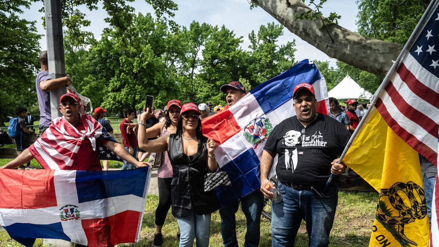 Supporters of President-elect Donald Trump waved Dominican flags as they gathered in the Bronx in May.