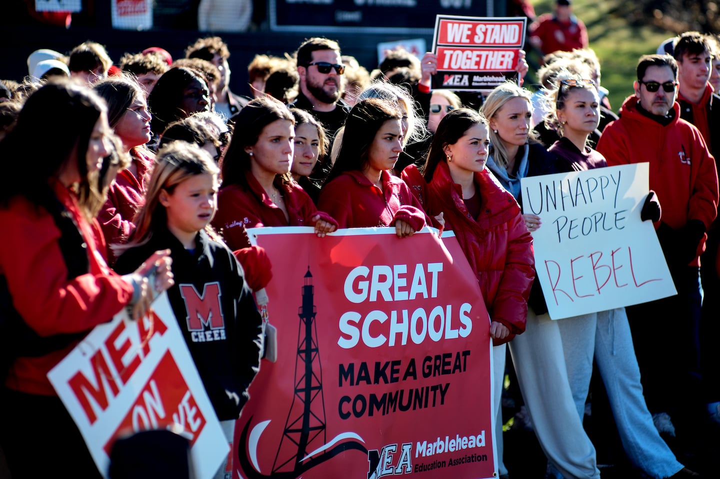 Striking teachers, students, and parents gathered for a rally at Seaside Park in Marblehead.