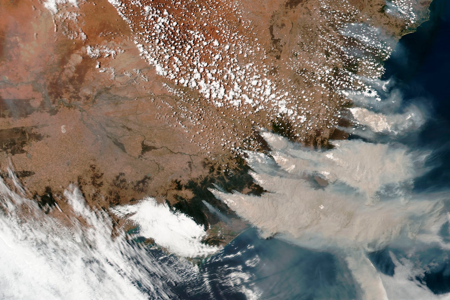 This satellite image provided by NASA on Jan. 4, 2020, shows smoke from wildfires in Victoria and New South Wales, Australia.