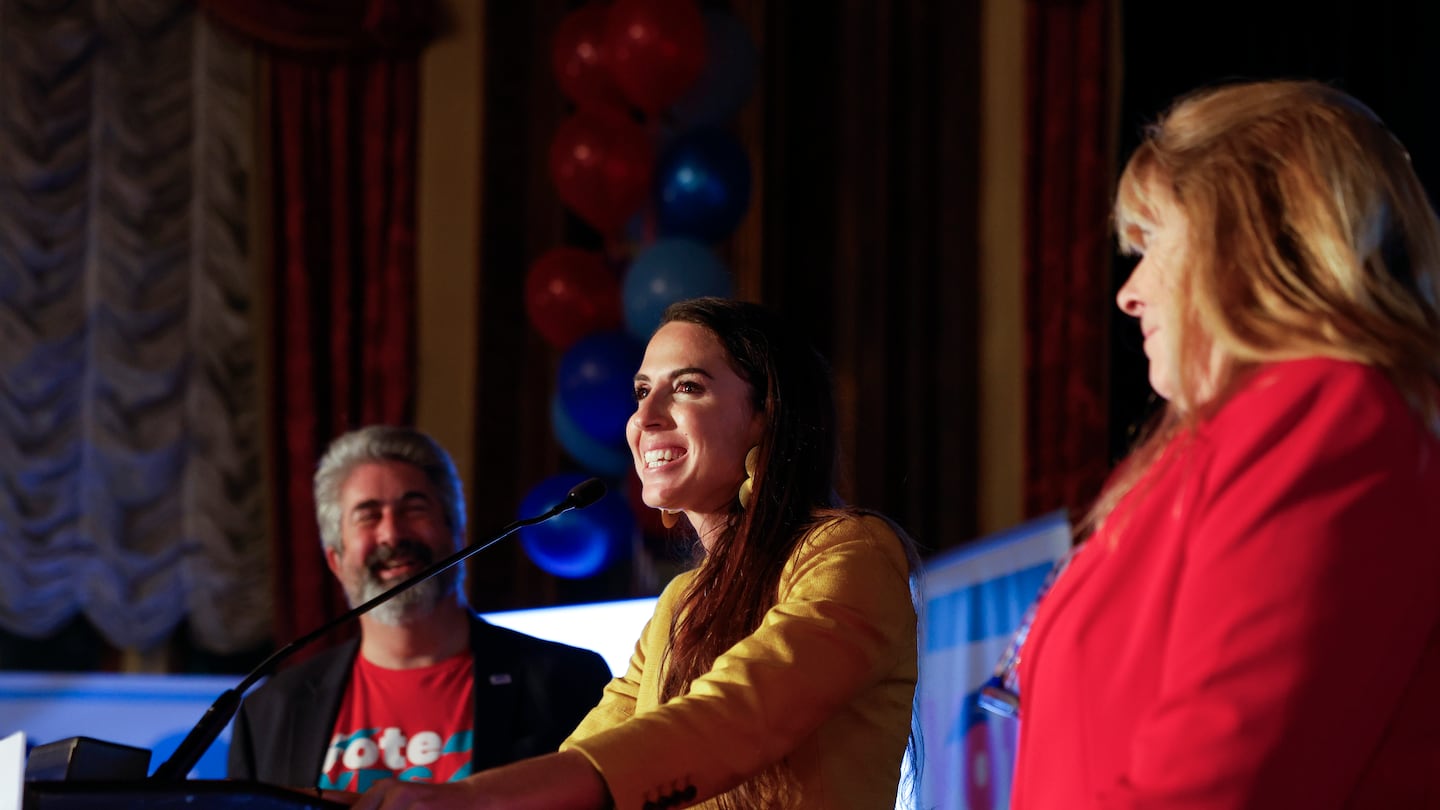 Diana DiZoglio, center, Massachusetts state auditor, spoke as Max Page, president of the Massachusetts Teachers Association, and Deb McCarthy, right, vice president of the MTA, stood by on Nov. 5.