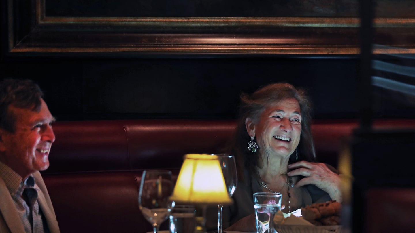 Mel Bernstein (left) and his wife Kathie (right) along with their daughter Elana and grandson Julian (not pictured) are shown as they enjoy themselves at the Capital Grille in the Back Bay.