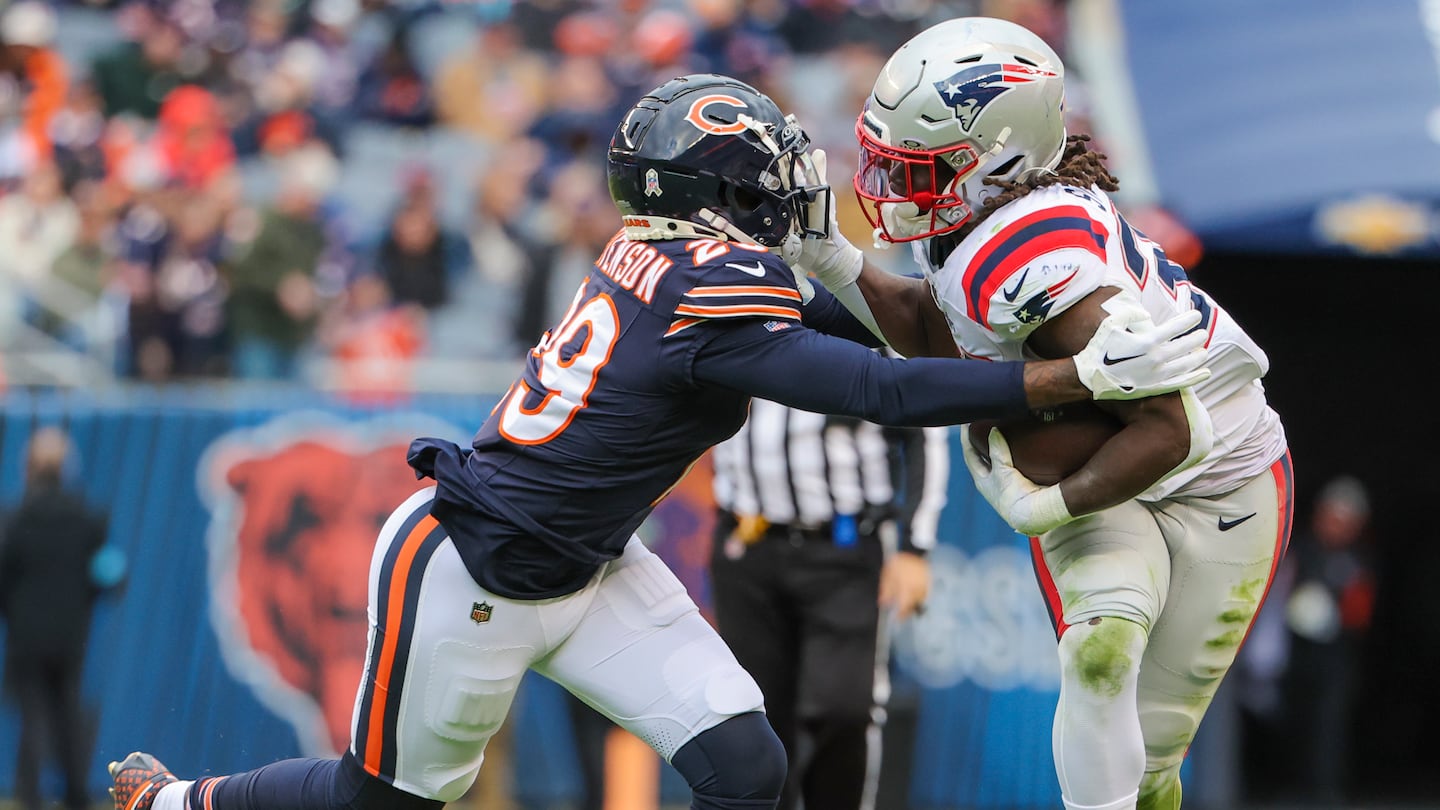 Rhamondre Stevenson (right) was back in form, gaining 74 yards on the ground in the win over the Bears.