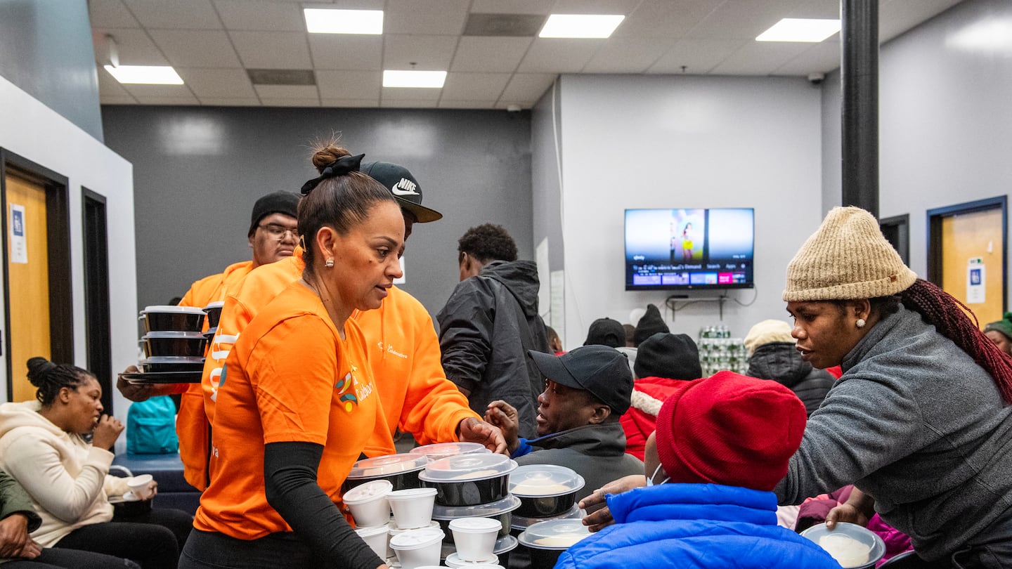 Jessica Armijo distributed food to refugees from Haiti at the La Colaborativa day shelter in Chelsea in February.