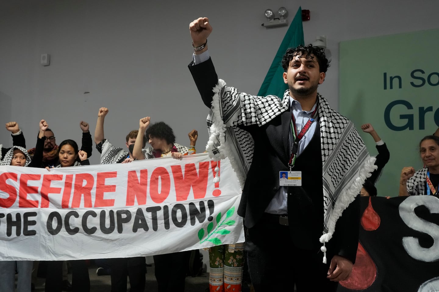 Activist Mohammed Usrof participates in a demonstration for climate justice and a ceasefire in the Israel-Hamas at the COP29 UN Climate Summit, on Nov. 11, in Baku, Azerbaijan.