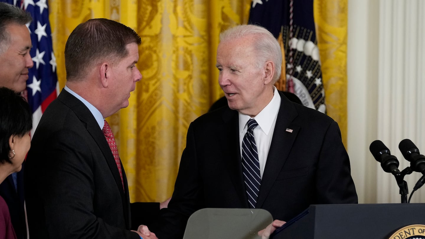 In March, 2023, President Joe Biden shook hands with outgoing Sec. of Labor Marty Walsh, during an event in the East Room of the White House