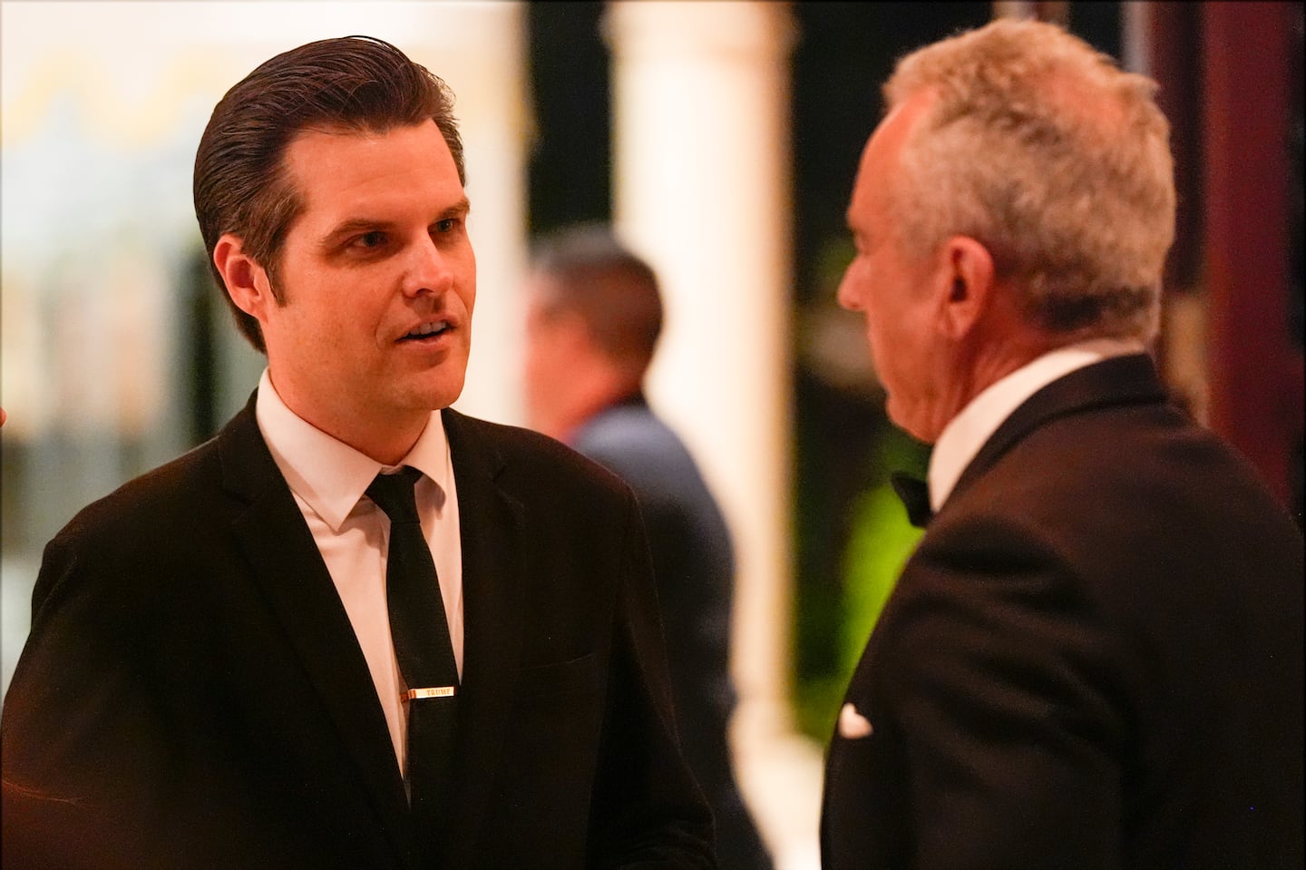 Matt Gaetz talks with Robert F. Kennedy Jr., before President-elect Donald Trump speaks during an America First Policy Institute gala at his Mar-a-Lago estate, Thursday, Nov. 14, 2024, in Palm Beach, Fla.