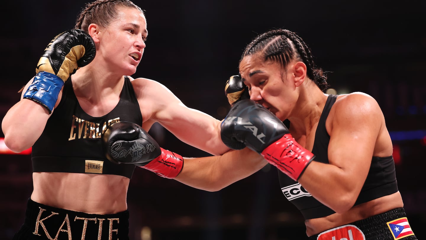 Katie Taylor (left) earned a unanimous decision Friday night against Amanda Serrano to retain her unanimous super lightweight championship.