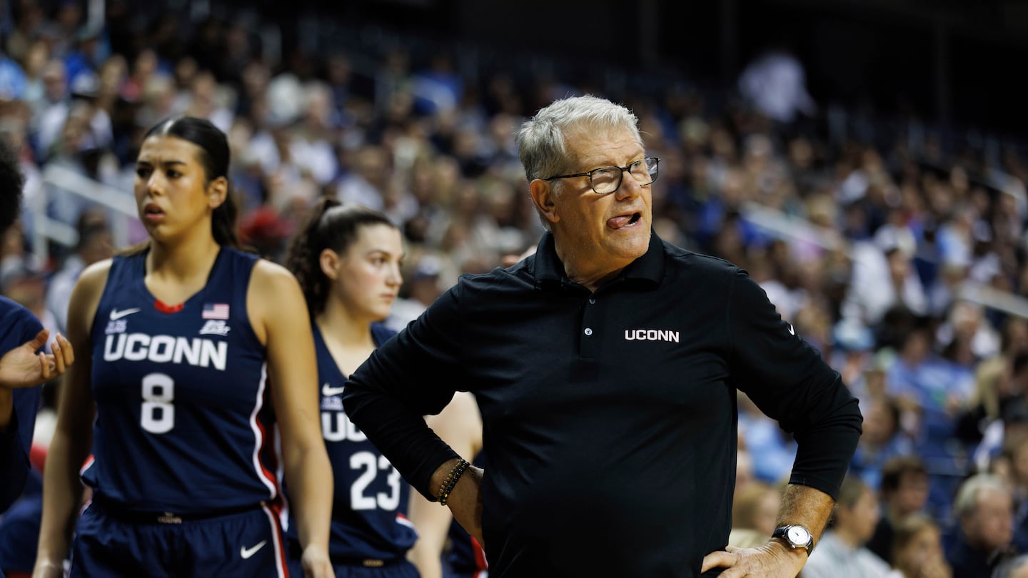 UConn coach Geno Auriemma earned his 1,216th career victory to tie the record for career victories in Division I men’s or women’s basketball with retired Stanford coach Tara VanDerveer.