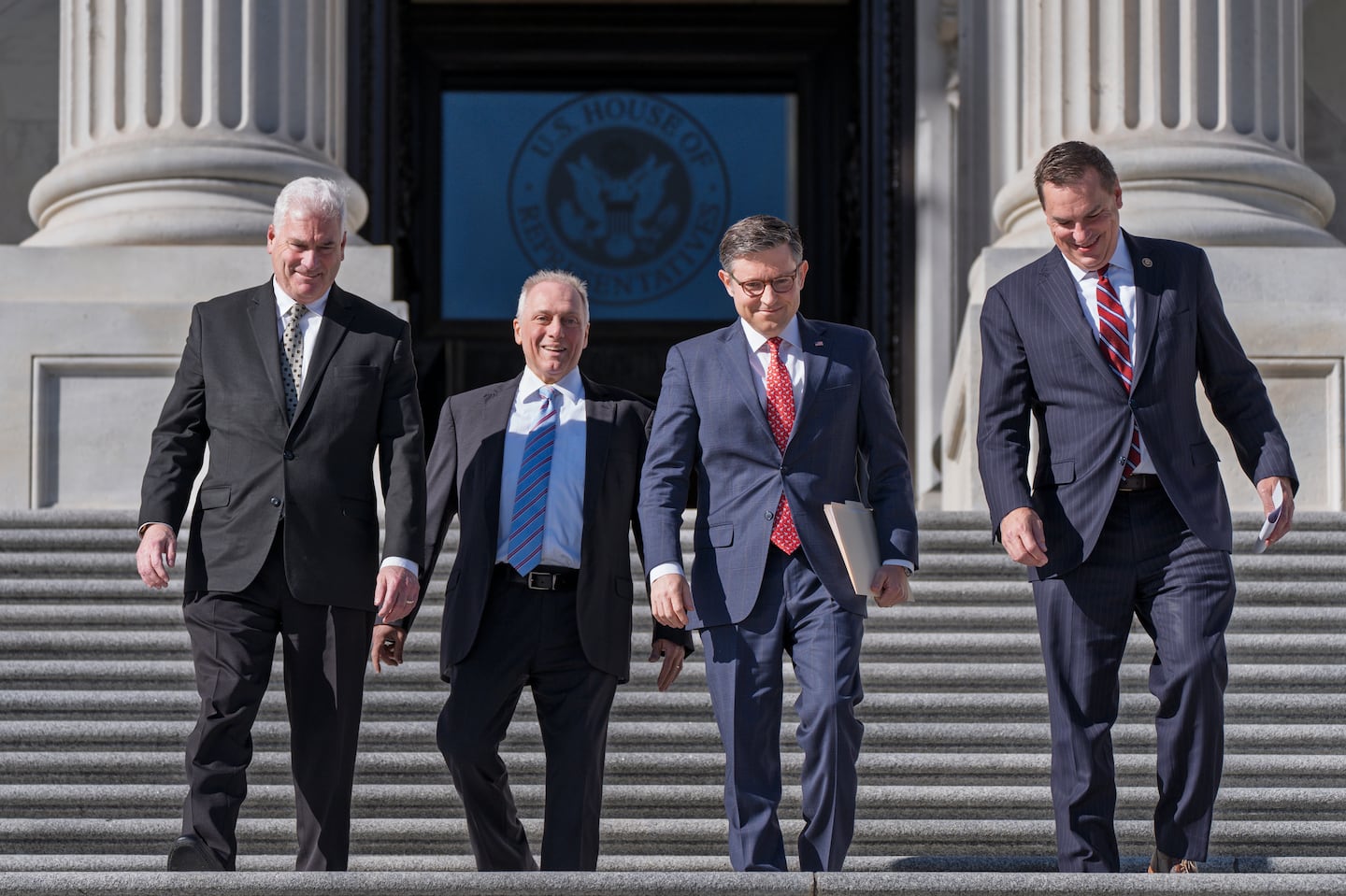 House Republican leaders, from left, Majority Whip Tom Emmer, R-Minn., Majority Leader Steve Scalise, R-La., Speaker of the House Mike Johnson, R-La., and Rep. Richard Hudson, R-N.C., chairman of the National Republican Congressional Committee, arrive to tout Republican wins and meet with reporters on the steps of the Capitol in Washington, on Nov. 12.