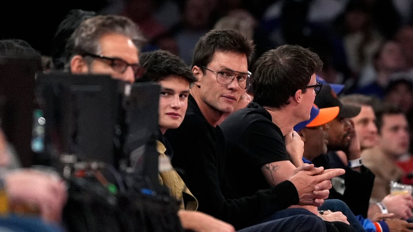 Tom Brady watches the Knicks-Nets game at Madison Square Garden on Friday night with his son, Jack.