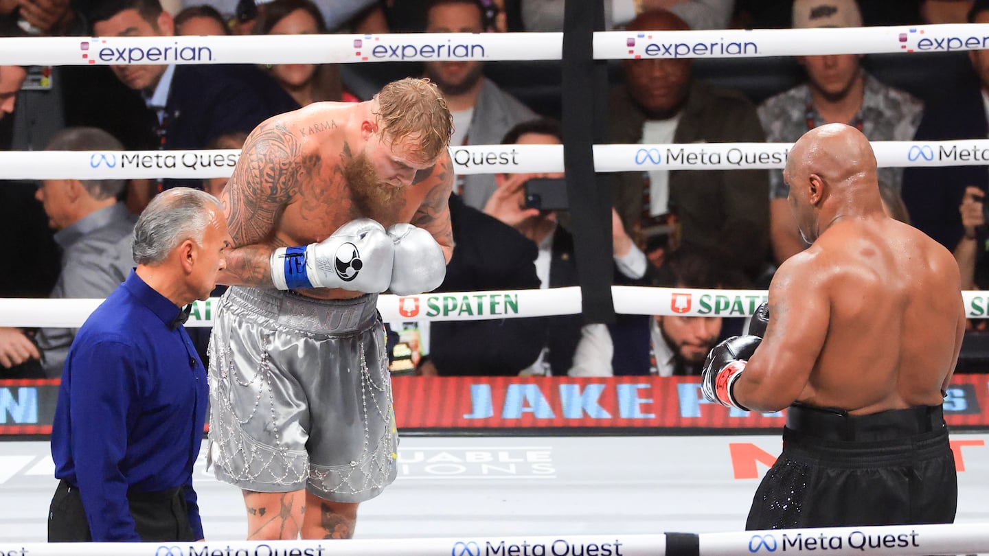 Jake Paul bows to Mike Tyson in the final seconds of their heavyweight bout on Friday night. Paul won by unanimous decision.