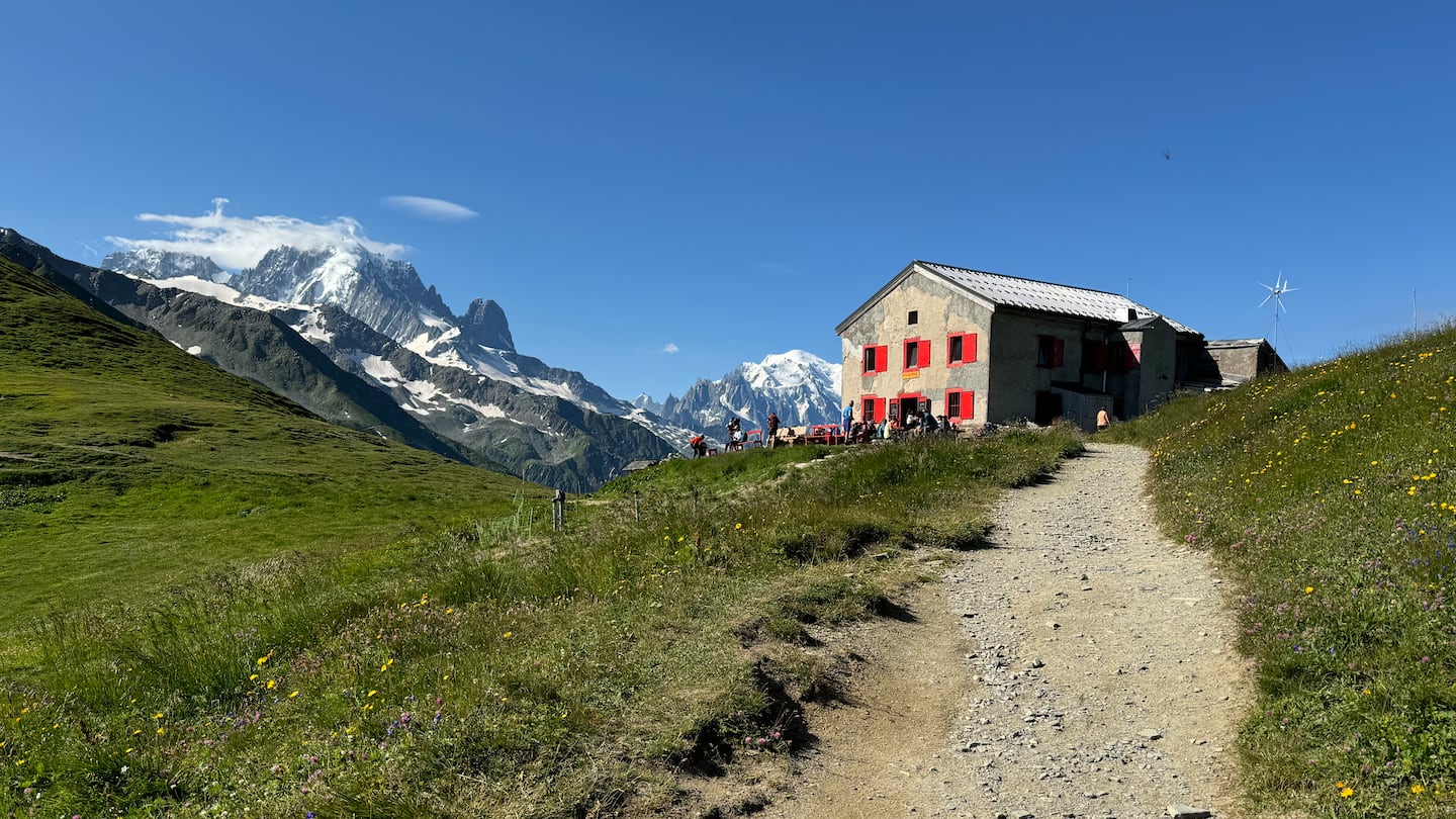 A mountain hut on the TMB in Switzerland, where weary hikers from Massachusetts would soon be refreshed by hot cappuccino in porcelain mugs.