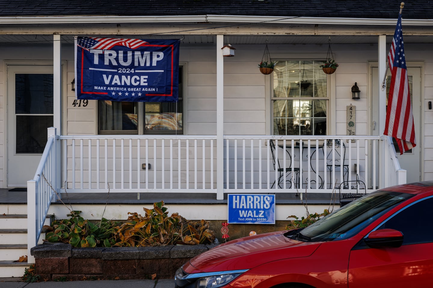 Dueling campaign signs were on display in front of a duplex home in Pen Argyl, Pa., on Nov. 2.