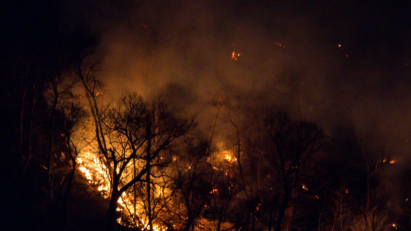 Wildfires burn along the New York and New Jersey border in Greenwood Lake, N.Y., on Nov. 13.