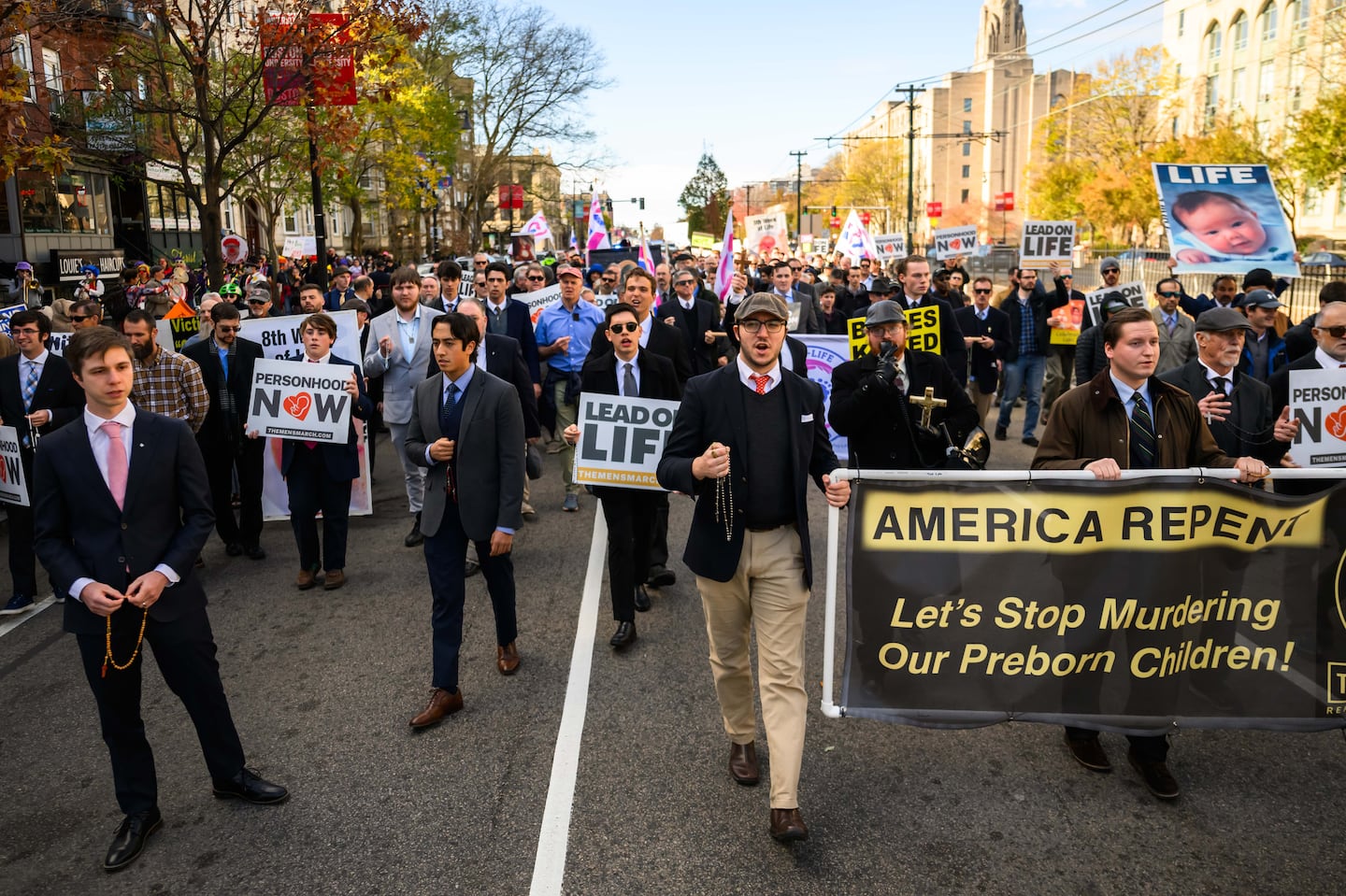 Participants marched down Commonwealth Avenue as the Men’s March to Abolish Abortion and Rally for Personhood started Saturday.