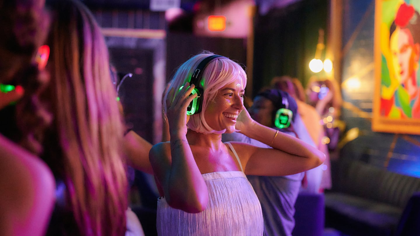 Attendees enjoying a silent disco, which will take place at Republic Fitness in Somerville.