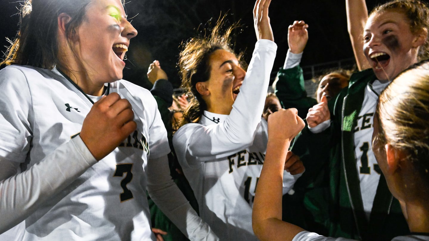 Neve Taylor (left) scored the winner in double overtime and joined her Bishop Feehan teammates in jubilation.