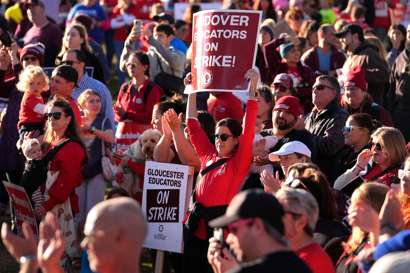 Teachers and supporters display placards during a rally last week.