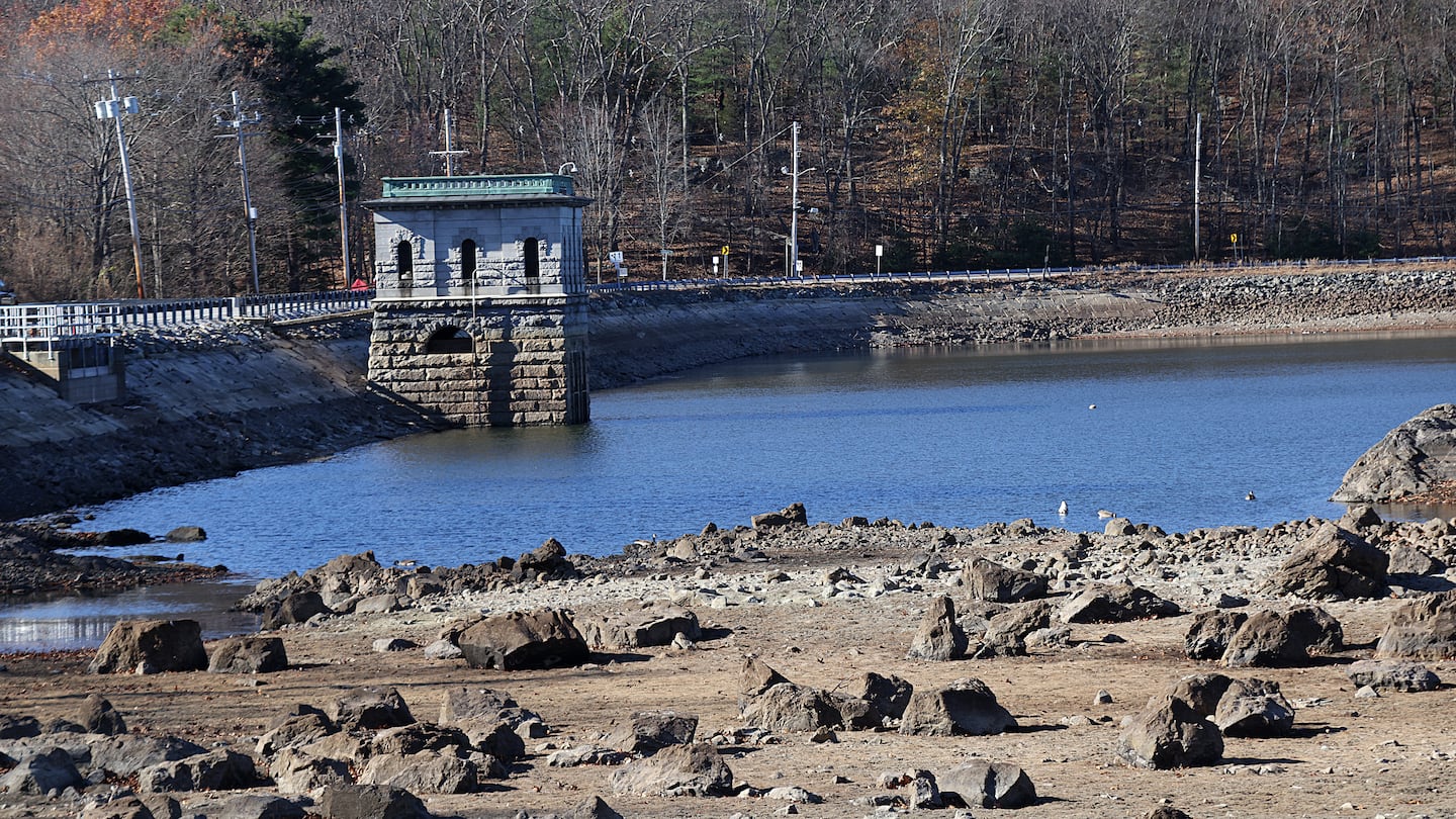 Part of the exposed bed of the Cambridge Reservoir in Waltham as seen on Friday.