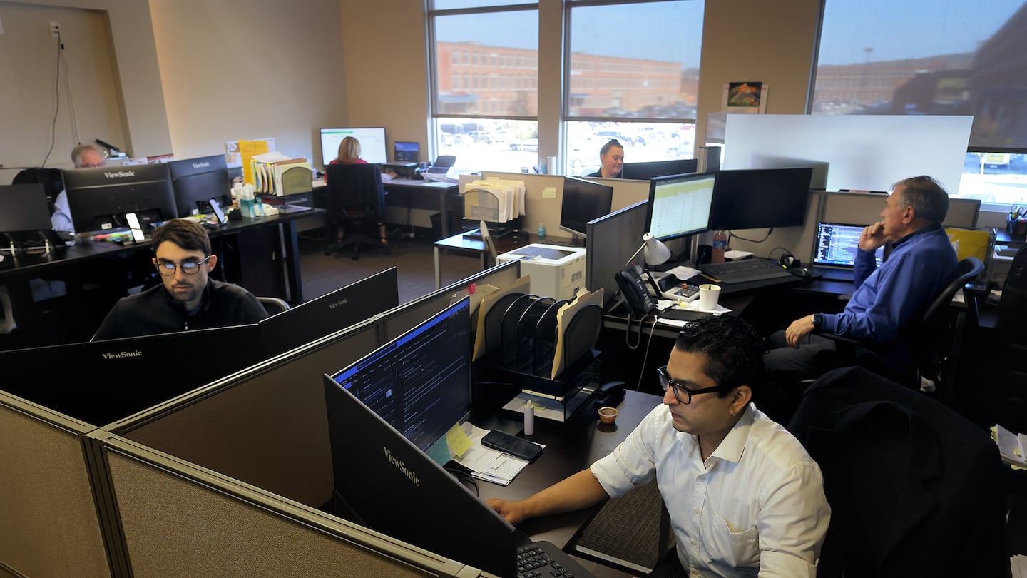 Staff in the accounting department at Lupoli Companies in Lawrence are back in the office five days a week.