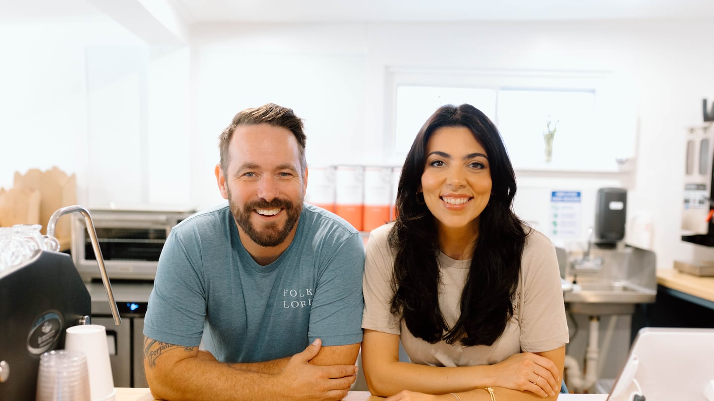 Chef Eli Dunn, left, and his wife Rachel Lopes-Almeida Dunn, right, inside of Folklore Provisions, their newly-opened quaint café in Bristol, R.I.