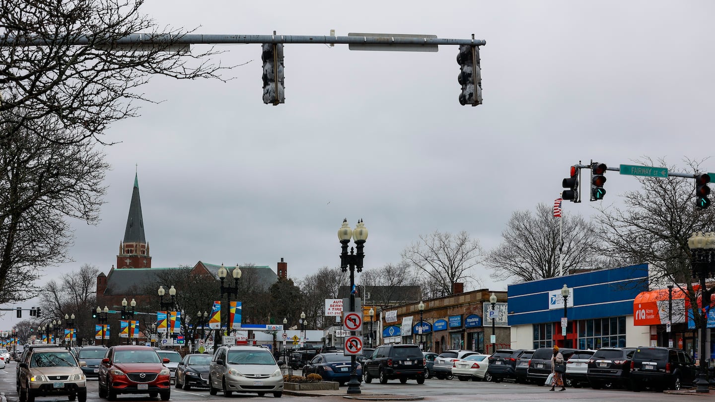 Traffic drives down Blue Hill Avenue in Mattapan in March 2024. In February Boston Mayor Michelle Wu, joined by Democratic U.S. Sens. Elizabeth Warren and Ed Markey, along with other officials, announced what they’re describing as a “historic” $44 million “transformation” of the street that links some of the city’s most diverse neighborhoods.