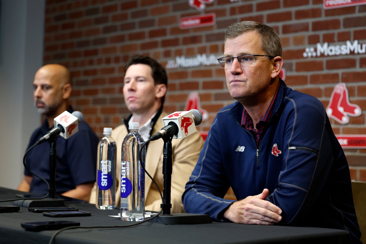 Sam Kennedy (right) sees better days ahead for the Red Sox than when he joined manager Alex Cora (left) and chief of baseball operations Craig Breslow at the 2024 season post-mortem at Fenway Park.