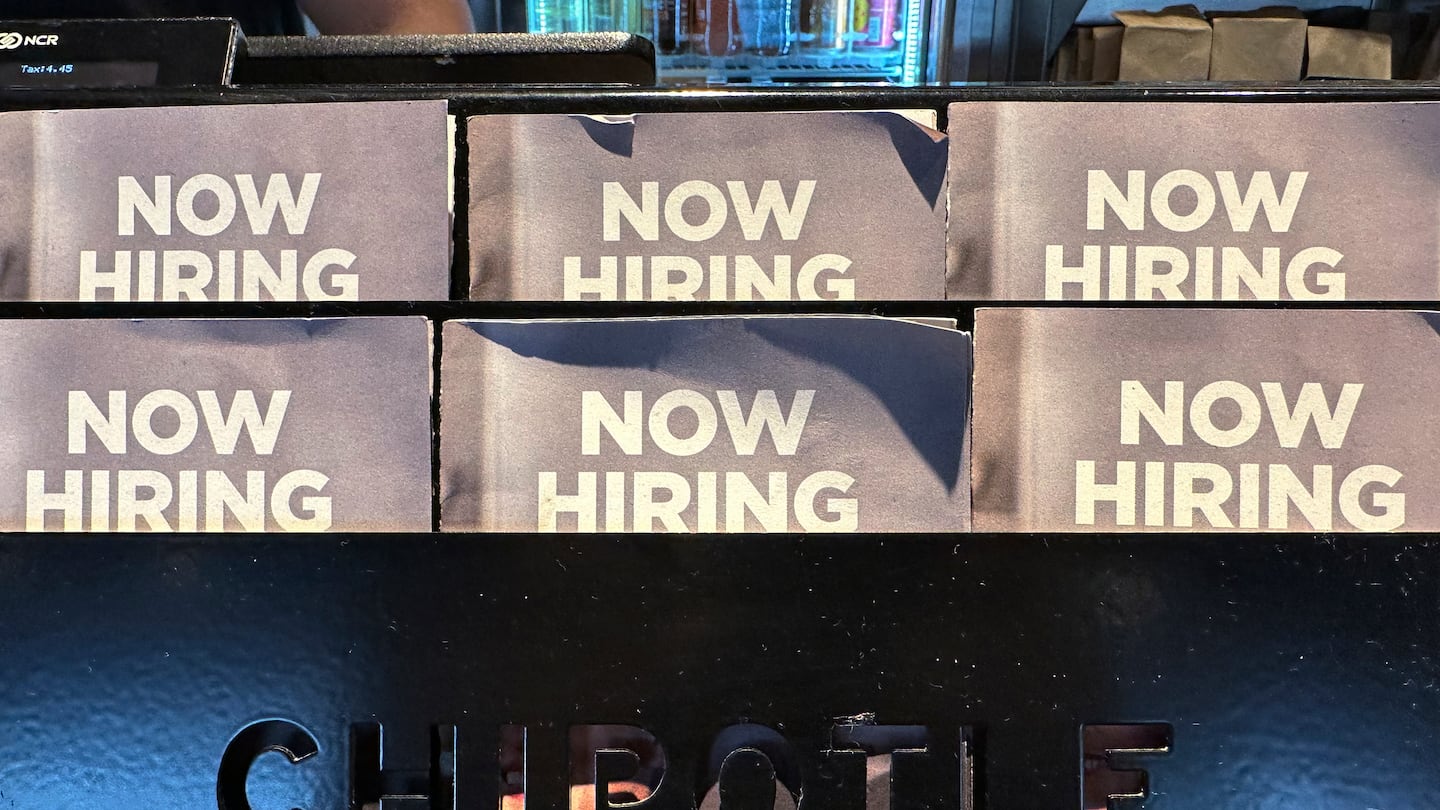 Hiring signs were displayed at a restaurant in Buffalo Grove, Ill., on Nov. 3.