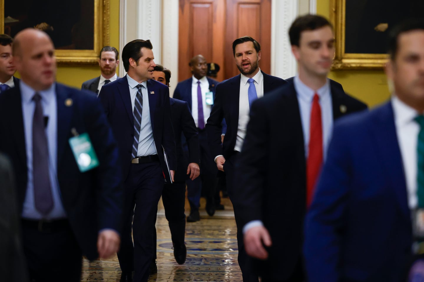 Former representative Matt Gaetz (L), President-elect Donald Trump's nominee to be attorney general, walks with Vice President-elect JD Vance as they arrive for meetings with Senators at the Capitol on Nov. 20, 2024 in Washington, DC.