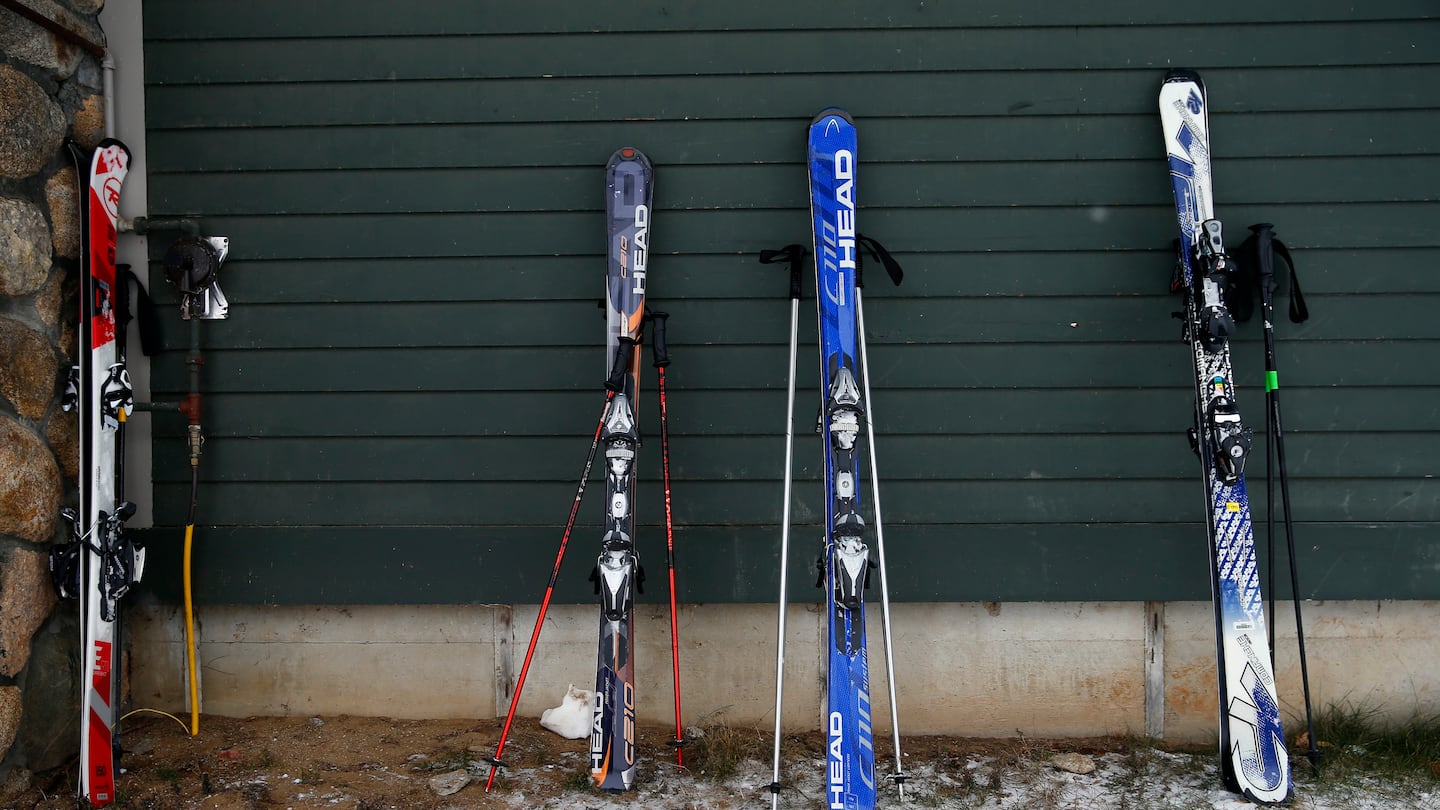 Skis rest on dirt at Cranmore Mountain Resort in North Conway, N.H., on Dec. 30, 2015.