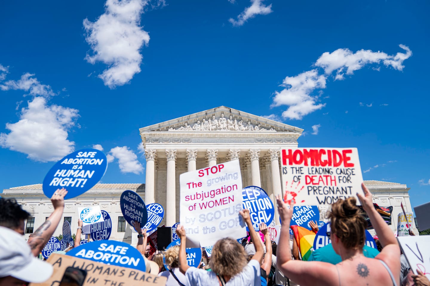 Antiabortion and abortion rights advocates gathered outside the Supreme Court on Nov. 18, 2024.