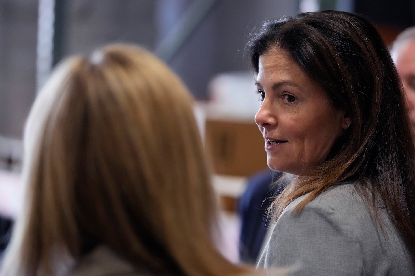 Republican gubernatorial candidate Kelly Ayotte, who faces Democrat Joyce Craig in the November 2024 election, during a visit to a local concrete coating business, Wednesday, Oct. 16, 2024, in Manchester, N.H.