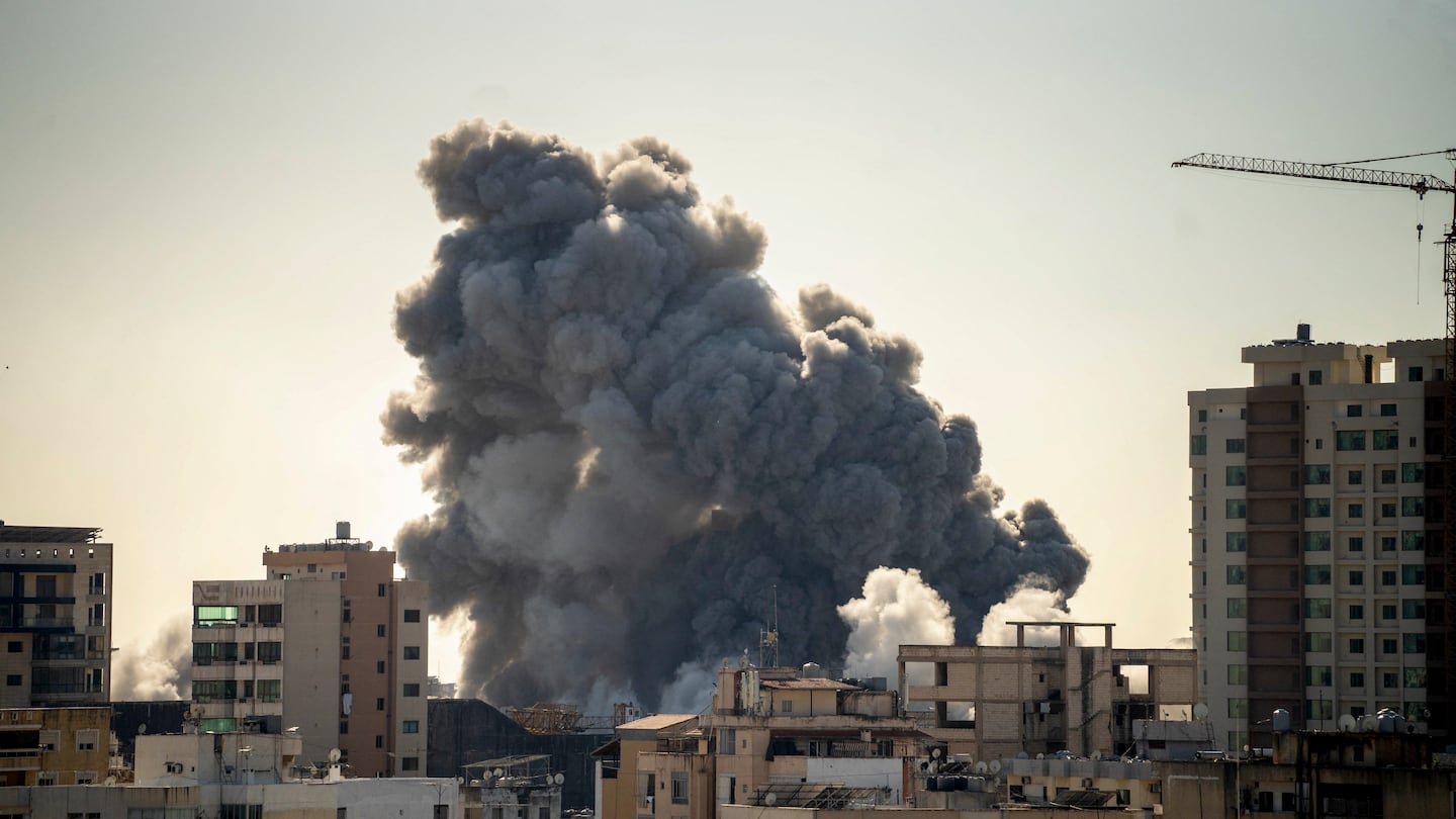 Smoke rose after an Israeli airstrike struck the southern suburbs of Beirut on Friday.