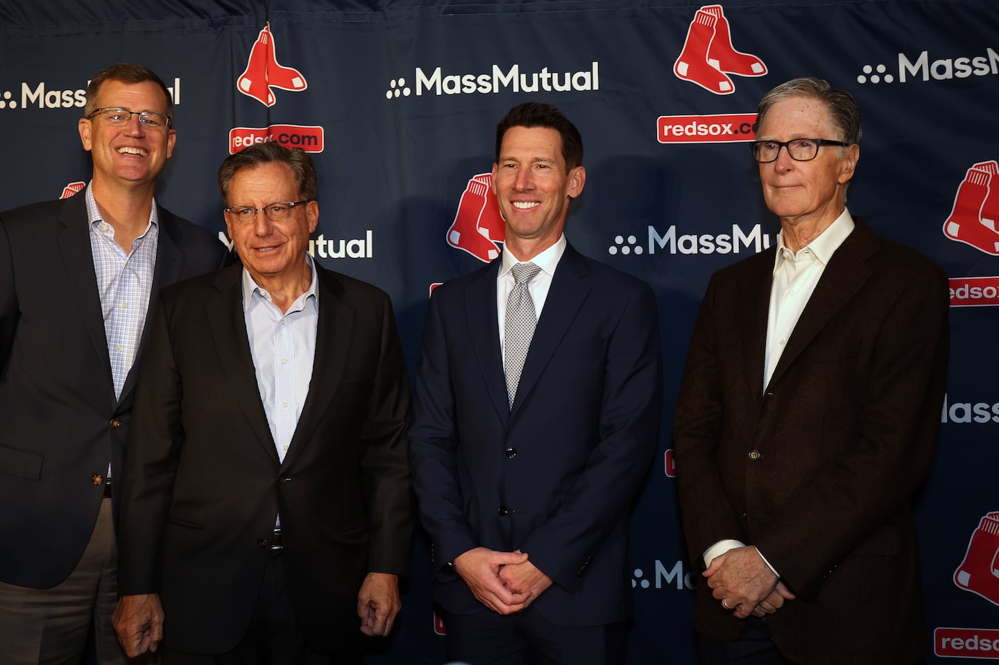 Red Sox president and chief executive officer Sam Kennedy, chairman Tom Werner, and director of baseball operations Craig Breslow — pictured with principal owner John Henry (right) — delivered Boston's initial pitch to free agent slugger Juan Soto.