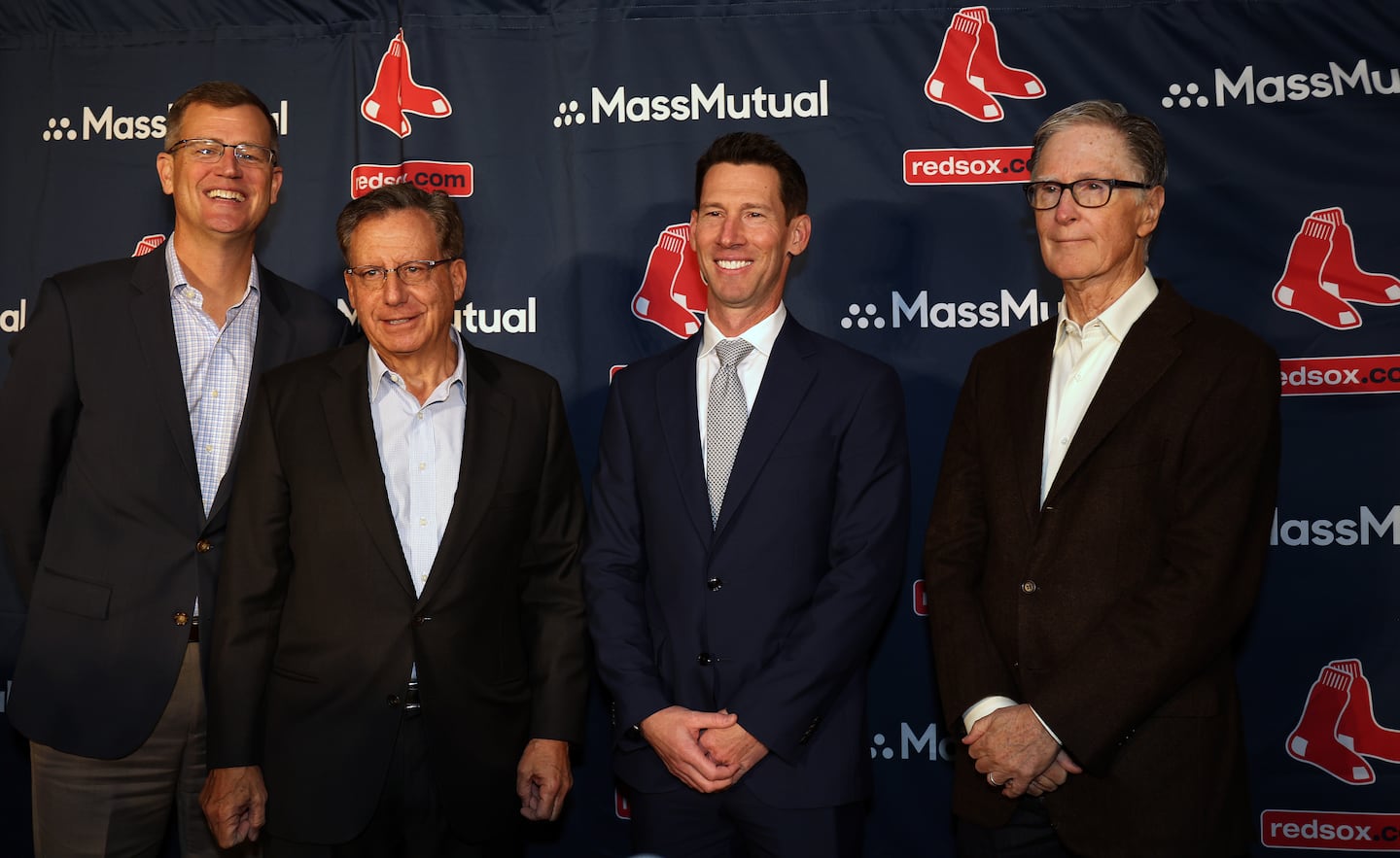 Red Sox president and chief executive officer Sam Kennedy, chairman Tom Werner, and director of baseball operations Craig Breslow — pictured with principal owner John Henry (right) — delivered Boston's initial pitch to free agent slugger Juan Soto.