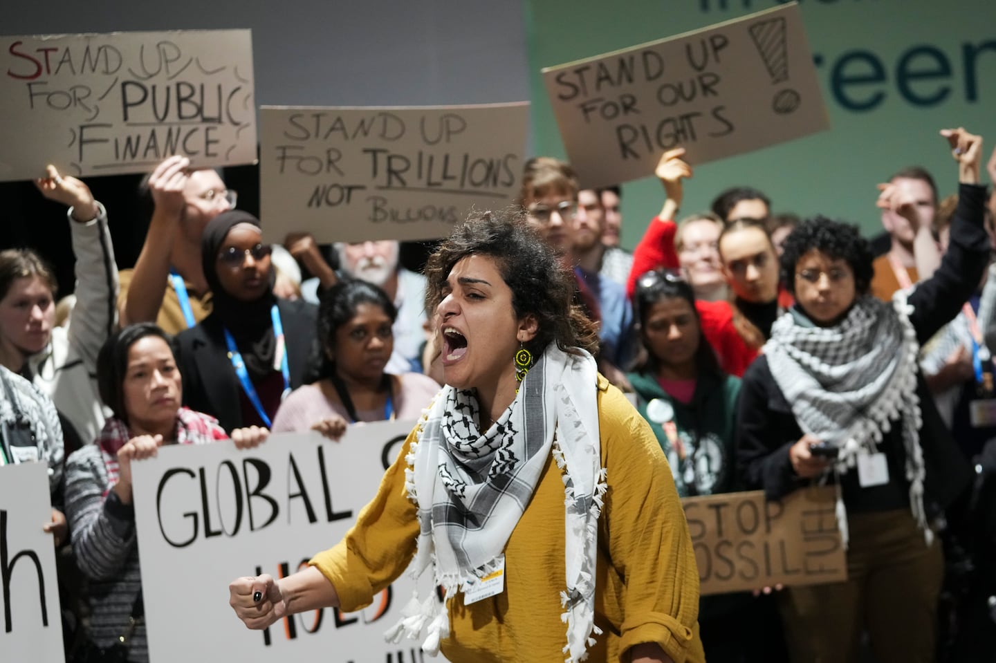 Activists participate in a demonstration for climate finance at the COP29 UN Climate Summit, on Nov. 23, in Baku, Azerbaijan.