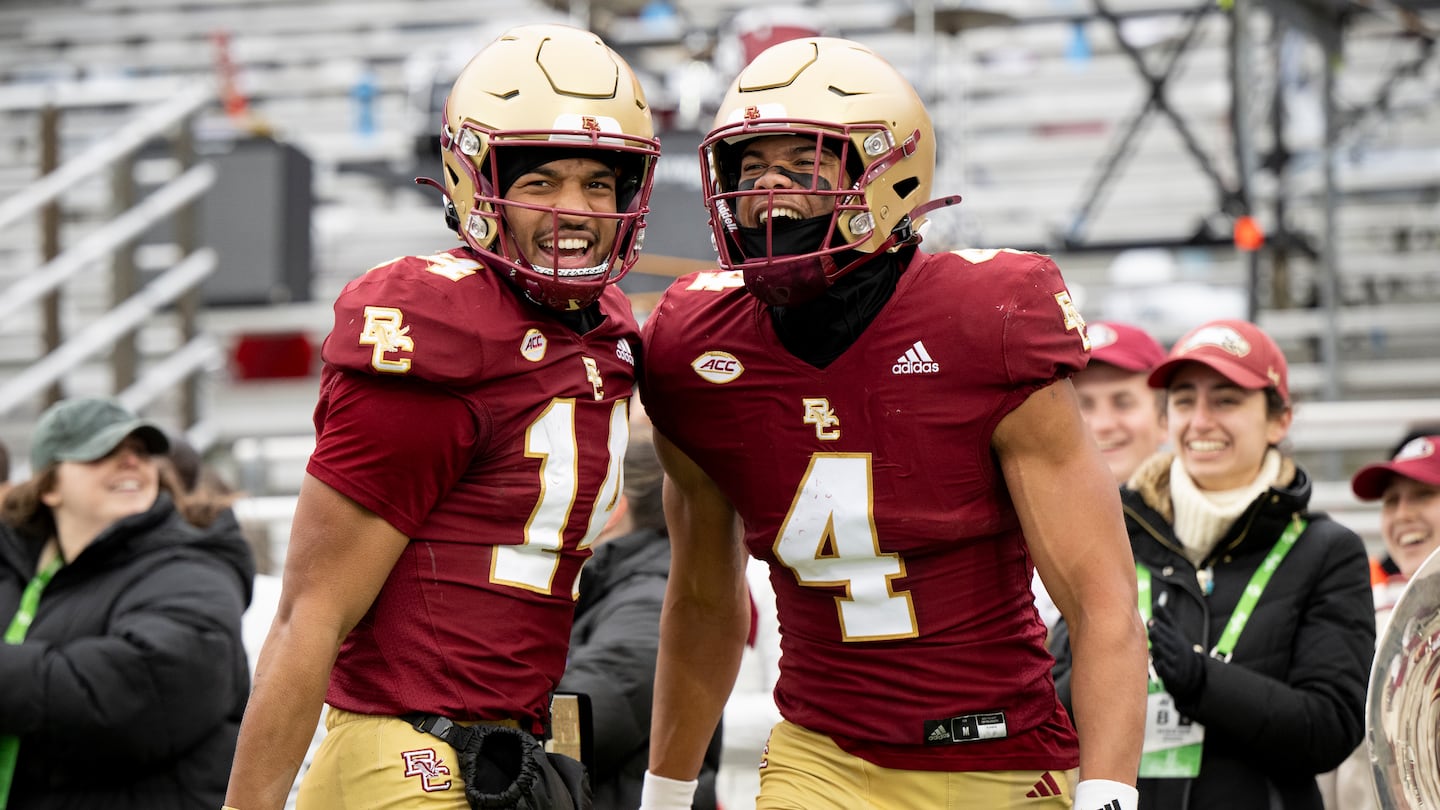 Boston College quarterback Grayson James (left) and wide receiver Reed Harris celebrated after connecting for an 18-yard touchdown pass to close out the first-half scoring.