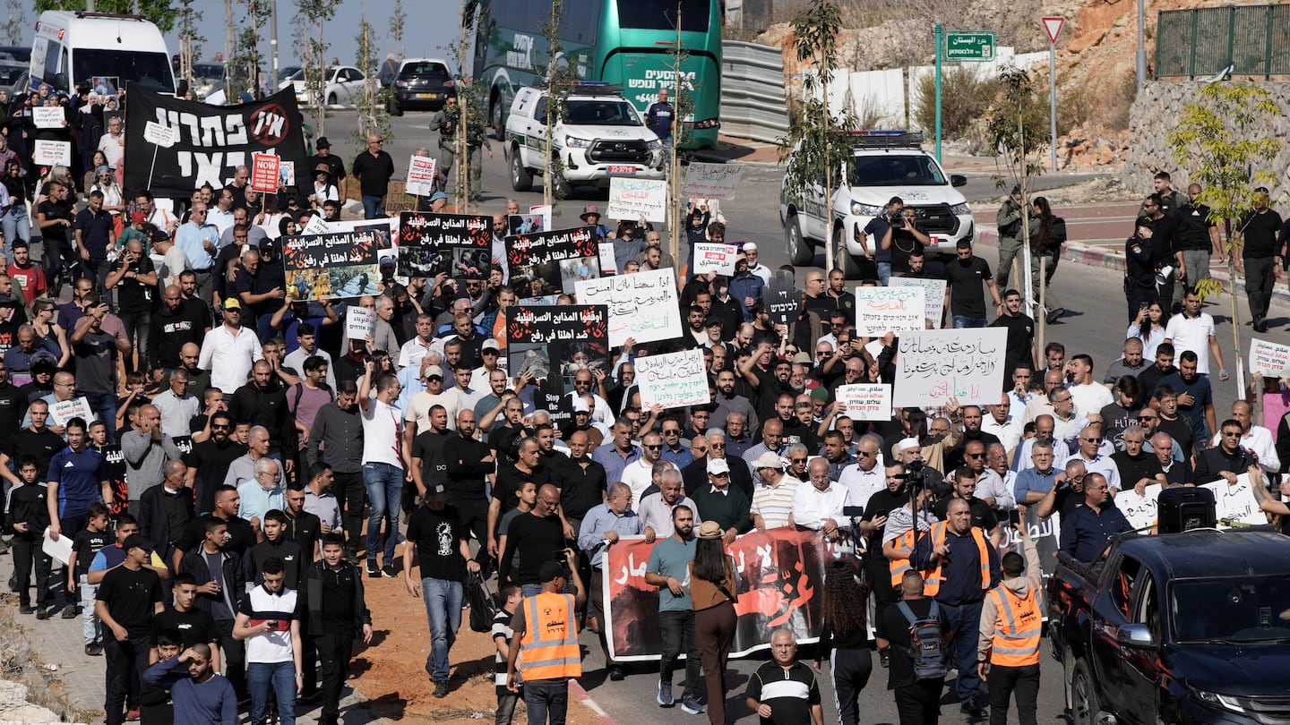 Palestinian citizens of Israel march against Israel's military operations in the Gaza Strip, in Umm al-Fahm, Israel, on Nov. 15.