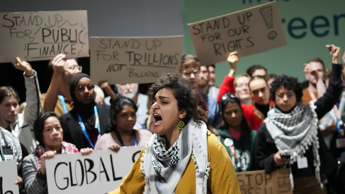 Activists participate in a demonstration for climate finance at the COP29 UN Climate Summit, on Nov. 23, in Baku, Azerbaijan.