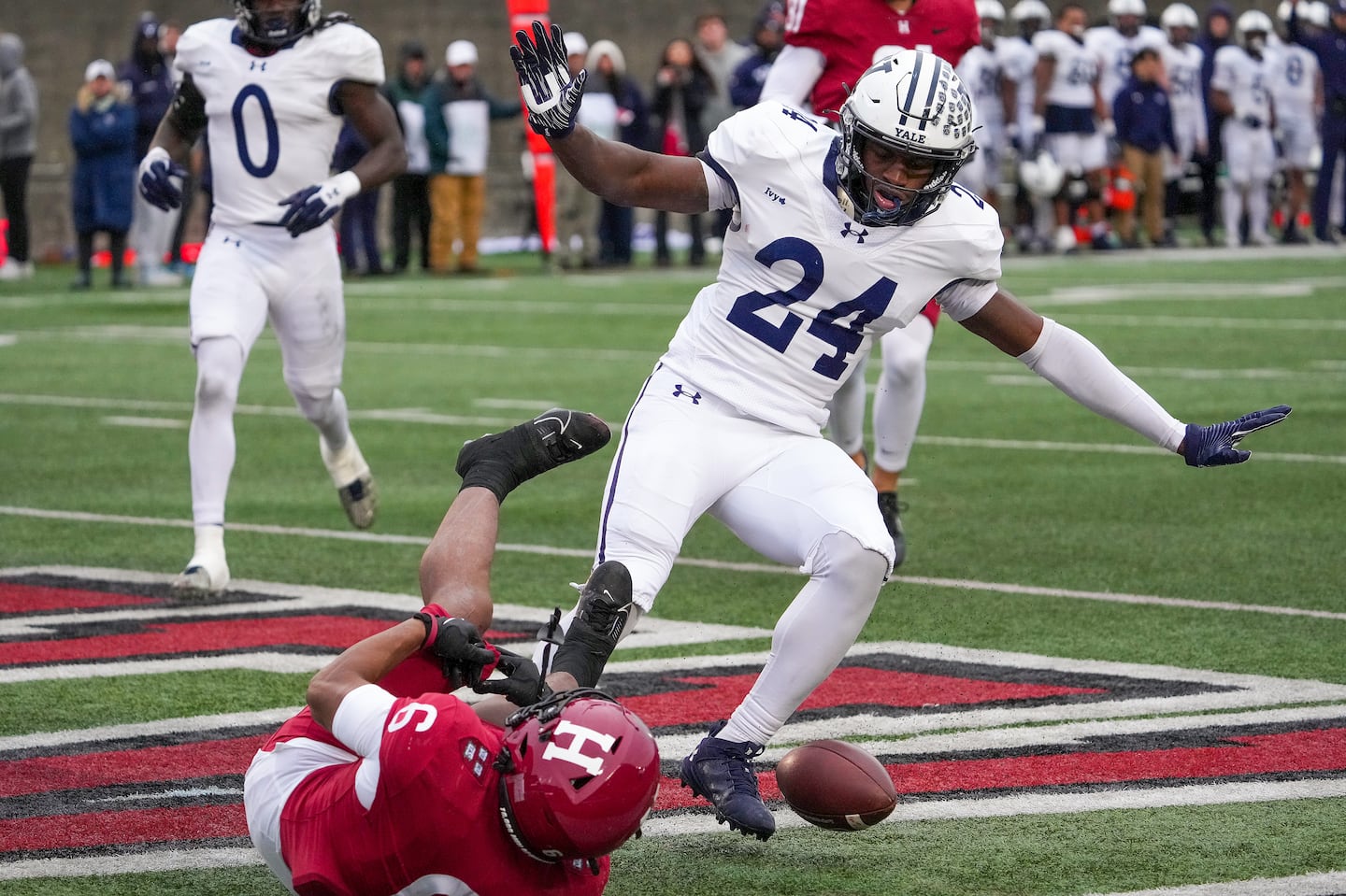 Yale linebacker Inumidun Ayo-Durojaiye (24) lets everyone know this pass to Harvard wideout Scott Woods II was incomplete in the end zone during the fourth quarter of The Game Saturday at Harvard Stadium.